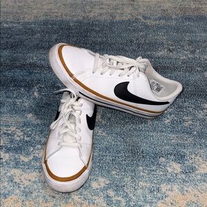 Nike White Sneakers with Black and Gold Details